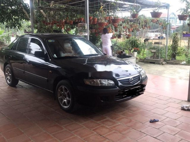 Bán xe Mazda 626 đời 2001, màu đen, xe nhập, giá tốt0