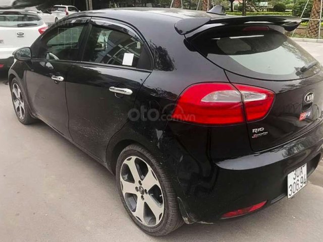 Cần bán lại xe Kia Rio 1.4 AT đời 2015, màu đen, nhập khẩu0