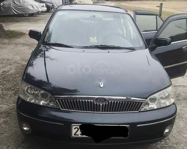 Bán Ford Laser năm sản xuất 2002, màu đen, xe nhập còn mới giá cạnh tranh0