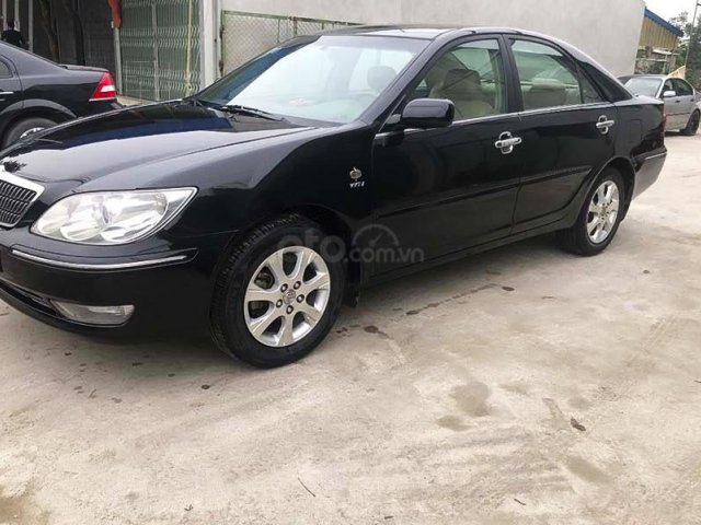 Bán Toyota Camry sản xuất 2006, màu đen còn mới