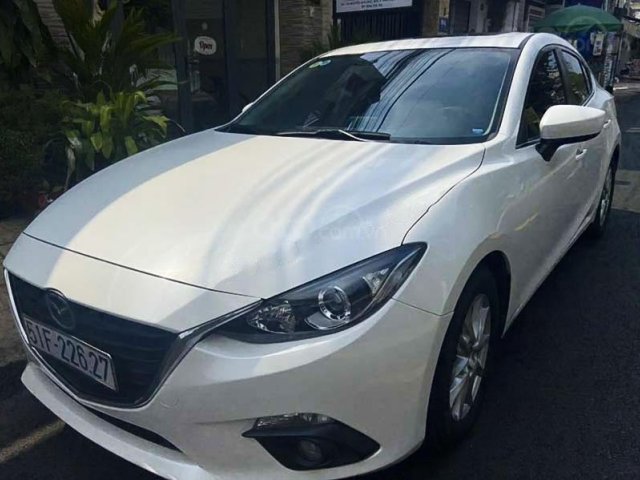 Bán xe Mazda 3 đời 2015, màu trắng chính chủ0