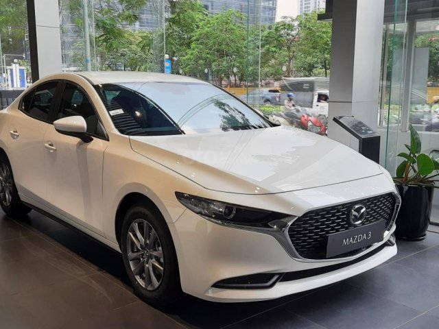 [Mazda Lê Văn Lương] bán xe Mazda 3 1.5L Luxury màu trắng, ưu đãi tiền mặt và nhiều khuyến mại khác