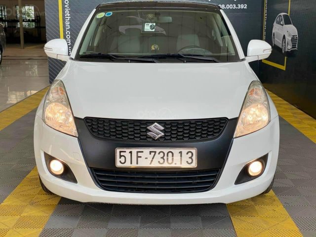 Cần bán xe Suzuki Swift 1.4AT 2016, màu trắng0