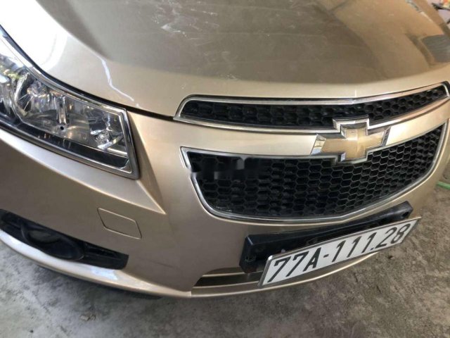 Cần bán xe Chevrolet Cruze, nâu vàng, sản xuất năm 2010 còn mới