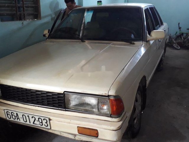 Bán Nissan Bluebird sản xuất năm 1986, màu trắng, nhập khẩu ít sử dụng0