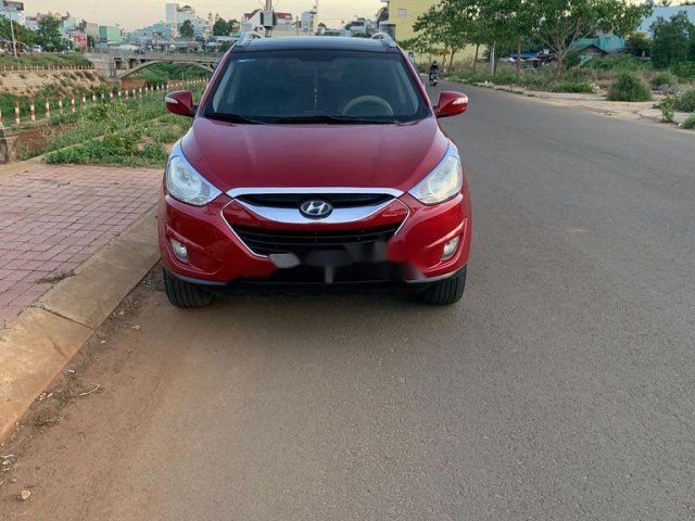 Cần bán xe Hyundai Tucson sản xuất năm 2010, màu đỏ, xe nhập