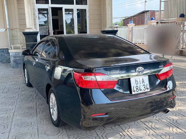 Xe nhà cần bán Camry đen 2.0E 2013, đi 87000km0