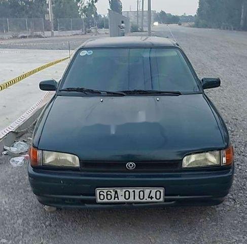 Bán Mazda 323F đời 1995, nhập khẩu, xanh đen0