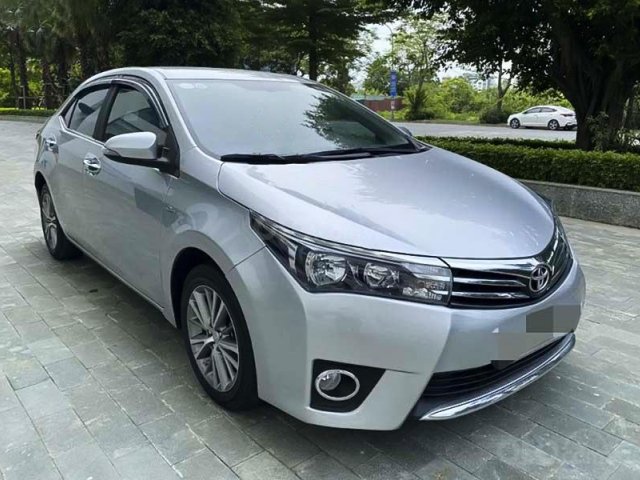 Cần bán gấp Toyota Corolla Altis 1.8G AT sản xuất năm 2016, màu bạc còn mới 