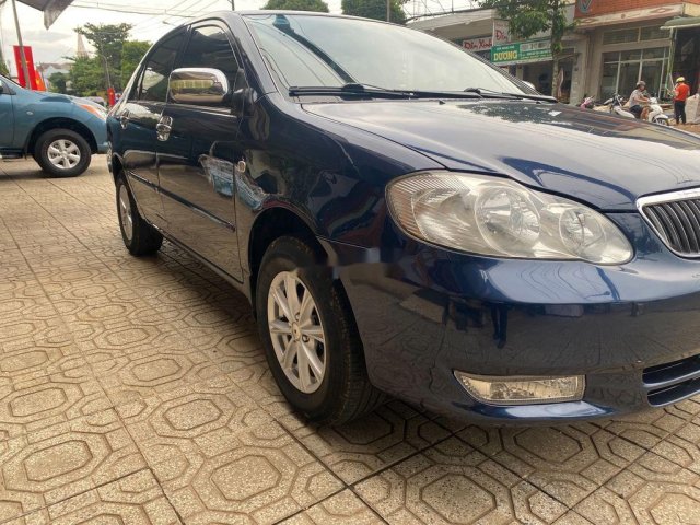 Cần bán Toyota Corolla Altis sản xuất năm 2003, màu xanh lam0