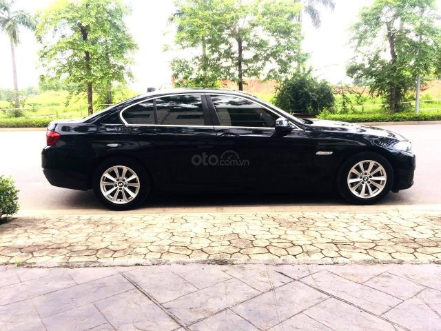 Xe BMW 520i màu đen sx 2014 cực đẹp0