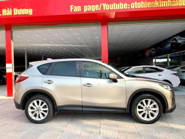 Bán Mazda CX 5 sản xuất 2013, màu vàng, giá tốt0