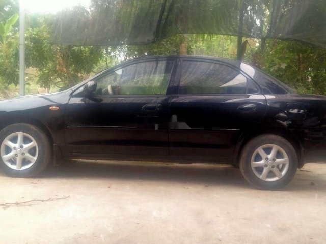 Cần bán lại xe Mazda 323 đời 1998, màu đen, nhập khẩu 0