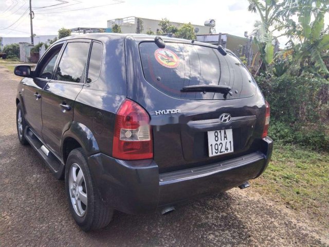 Bán xe Hyundai Tucson đời 2009, màu xanh đen, xe nhập số sàn0