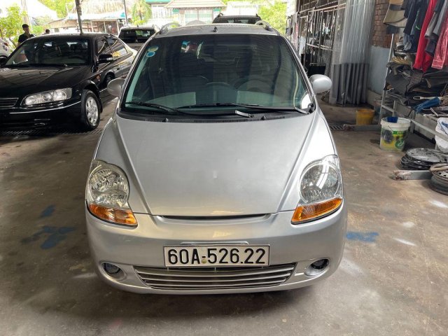 Cần bán gấp Chevrolet Spark LT đời 2009, màu bạc0