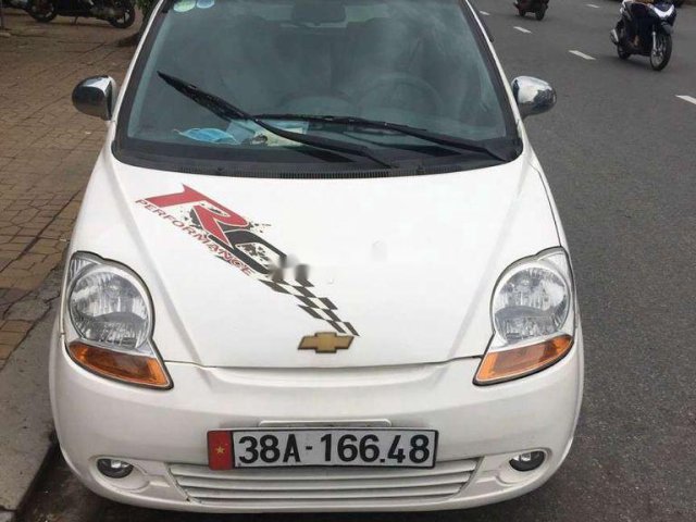 Cần bán Chevrolet Spark đời 2009, màu trắng, xe nhập, 85tr0