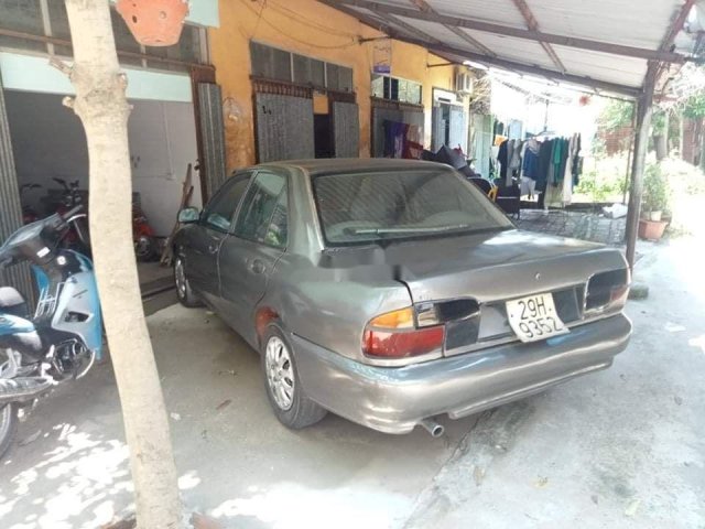 Cần bán lại xe Proton Wira đời 1997, màu xám, nhập khẩu nguyên chiếc0