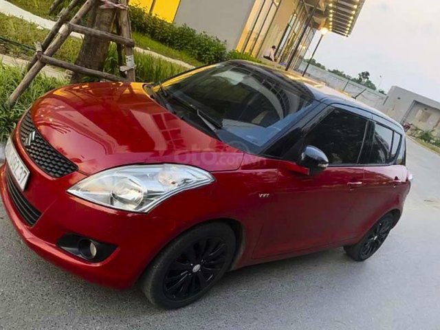 Bán ô tô Suzuki Swift 1.4 AT đời 2014, màu đỏ, 342tr