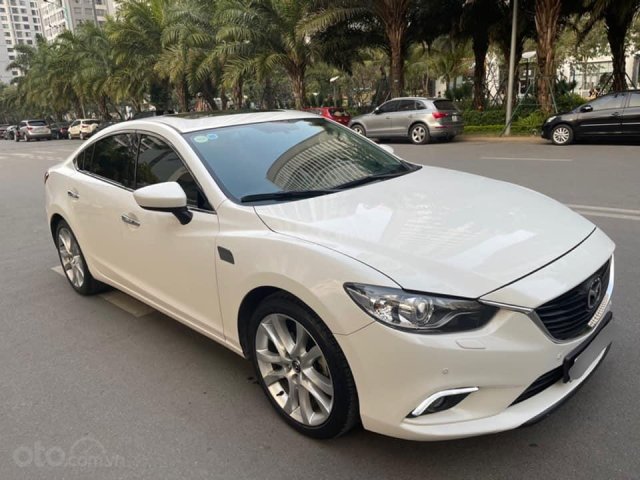 Bán Mazda 6 năm sản xuất 2015, màu trắng, nhập khẩu nguyên chiếc chính chủ, 620 triệu