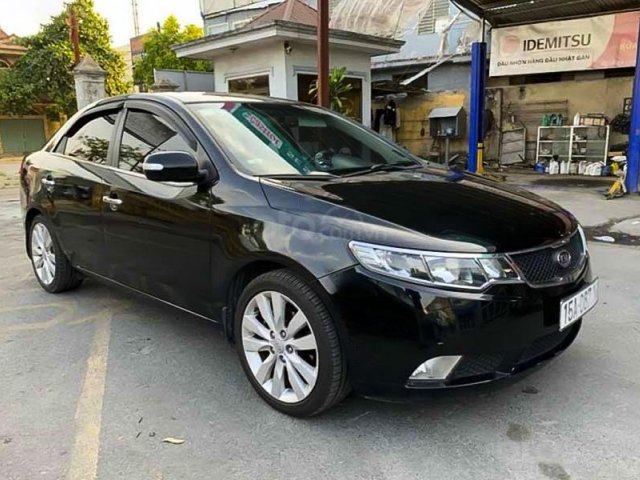 Bán ô tô Kia Cerato 1.6 AT sản xuất 2009, màu đen, nhập khẩu nguyên chiếc còn mới, 306 triệu