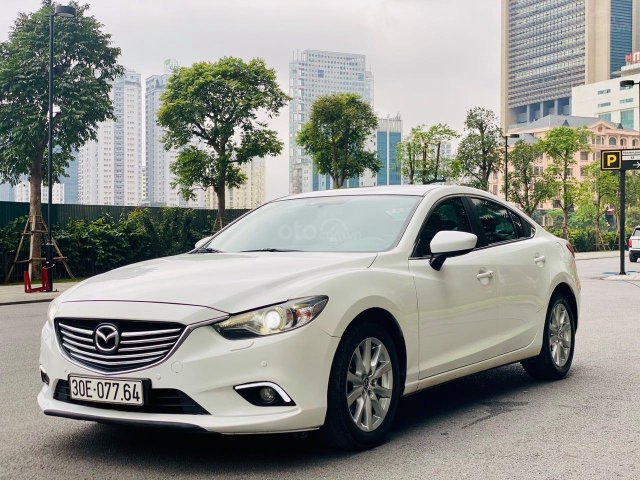 Cần bán Mazda 6 năm sản xuất 2016, màu trắng như mới, giá 615tr