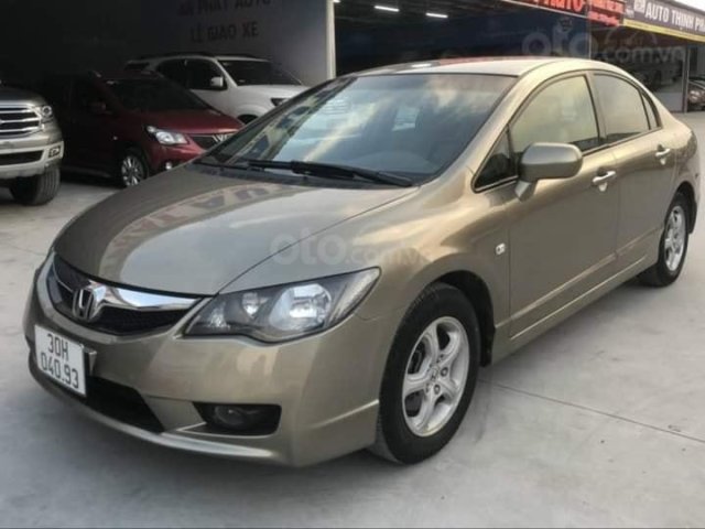 Cần bán lại xe Honda Civic 1.8AT sản xuất năm 2010, màu ghi vàng0