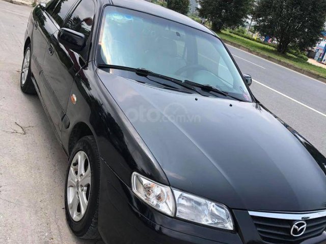 Cần bán Mazda 626 sản xuất năm 2000, màu đen, nhập khẩu0