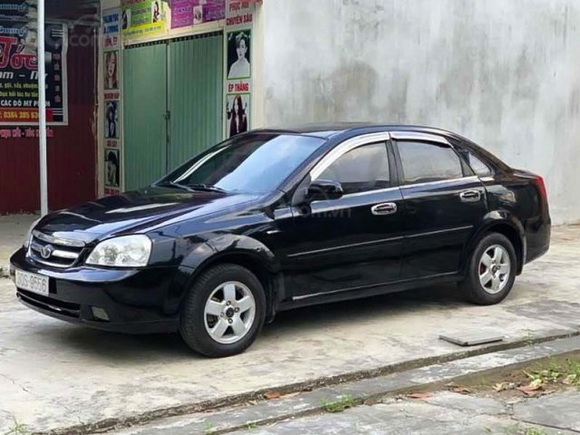 Cần bán Daewoo Lacetti EX sản xuất 2009, màu đen như mới, giá chỉ 137 triệu