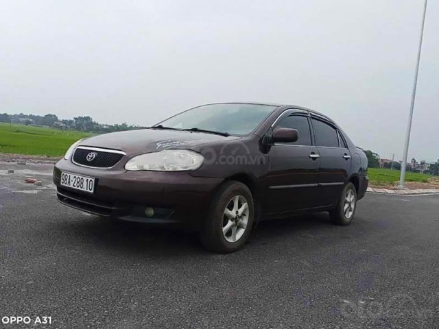 Bán Toyota Corolla Altis đời 2002, màu tím còn mới0