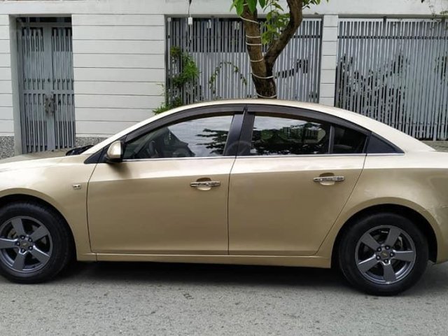 Bán Chevrolet Cruze đời 2011, màu vàng