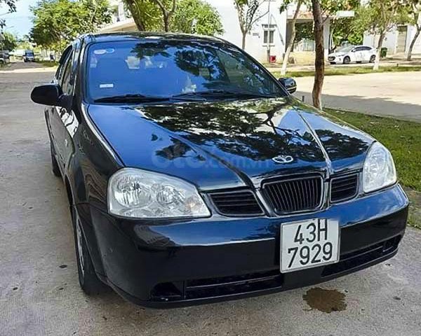 Cần bán lại xe Daewoo Lacetti năm sản xuất 2004, màu đen  