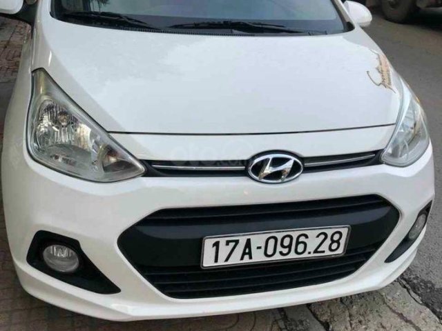 Bán Hyundai Grand i10 đời 2015, màu trắng số tự động, 305tr0