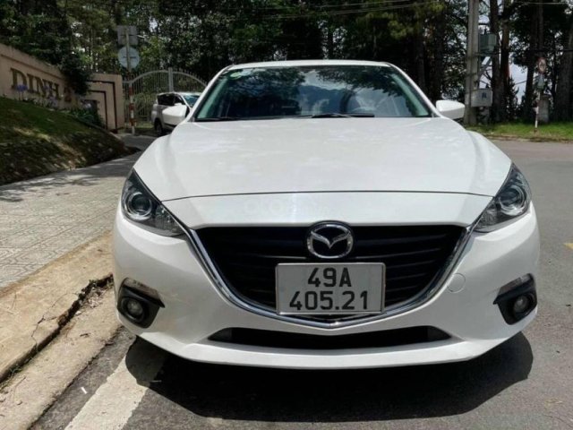 Cần bán gấp Mazda 3 1.5 AT sản xuất 2015, màu trắng xe gia đình, giá 483tr