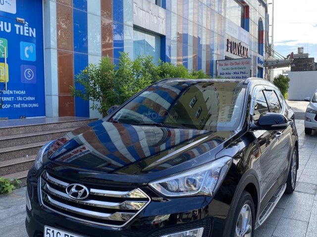 Bán Hyundai Santa Fe đời 2015, màu đen xe gia đình0