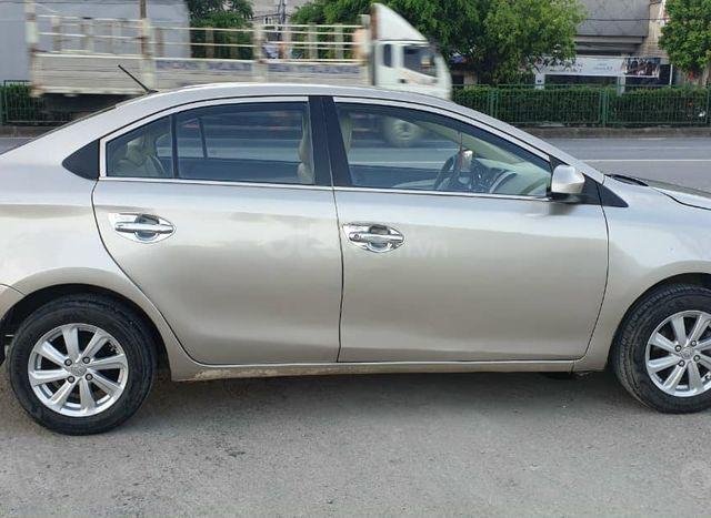 Cần bán gấp Toyota Vios đời 2014, màu ghi vàng