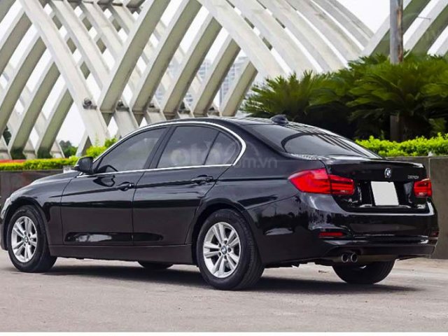 Cần bán BMW 320i đời 2016, màu đen, nhập khẩu nguyên chiếc  