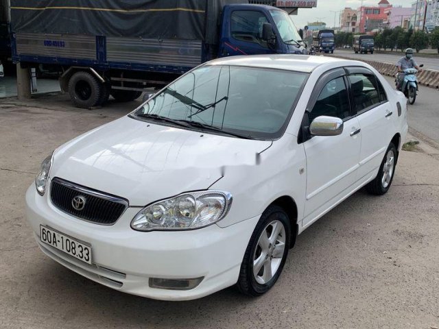 Cần bán lại xe Toyota Corolla Altis sản xuất 2001, màu trắng số sàn0