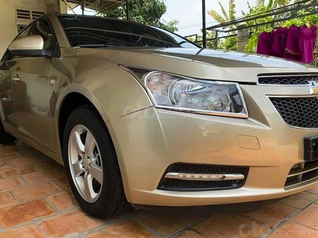 Bán Chevrolet Cruze LS 1.6 MT sản xuất năm 2011, màu vàng cát còn mới0