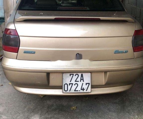 Cần bán xe Fiat Siena năm 2002, màu vàng, xe nhập còn mới, giá tốt