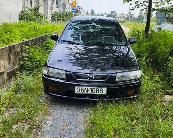 Xe Mazda 323 sản xuất năm 1998, màu đen