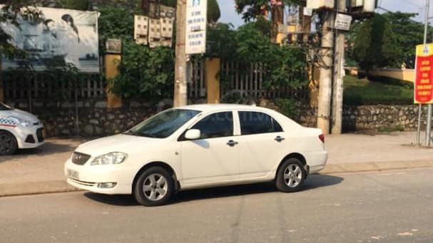 Bán xe Toyota Corolla sản xuất 2001, màu trắng giá cạnh tranh0