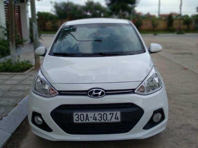 Bán xe Hyundai Grand i10 1.2 AT sản xuất 2014 còn mới giá cạnh tranh0