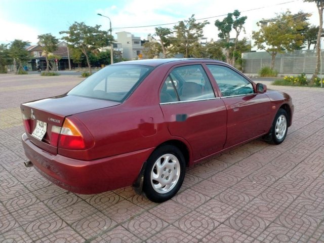 Bán Mitsubishi Lancer đời 2001, màu đỏ còn mới, 115tr0