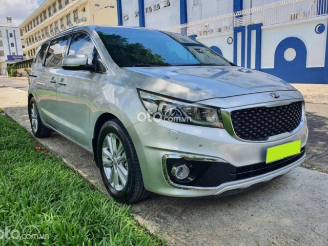 Cần bán gấp Kia Sedona 3.3 GATH AT năm sản xuất 2016, màu bạc  0