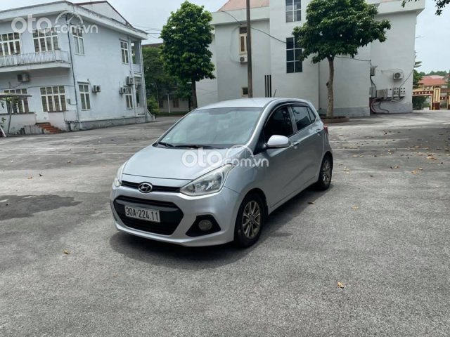 Bán xe Hyundai Grand i10 đời 2014, màu bạc số sàn