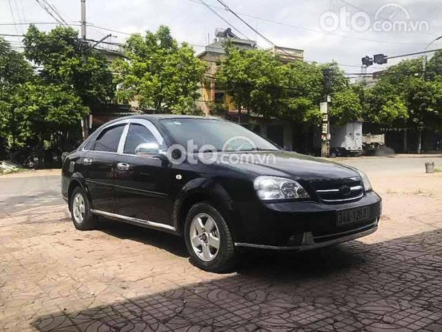 Cần bán gấp Daewoo Lacetti sản xuất năm 2009, màu đen còn mới0