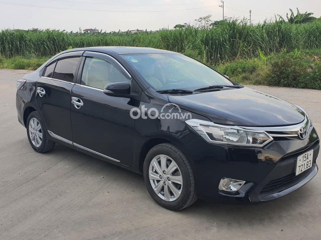 Cần bán Toyota Vios E năm 2014, màu đen số sàn