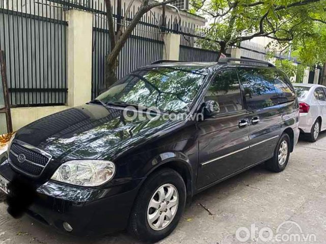 Cần bán gấp Kia Carnival sản xuất 2009, màu đen, nhập khẩu0