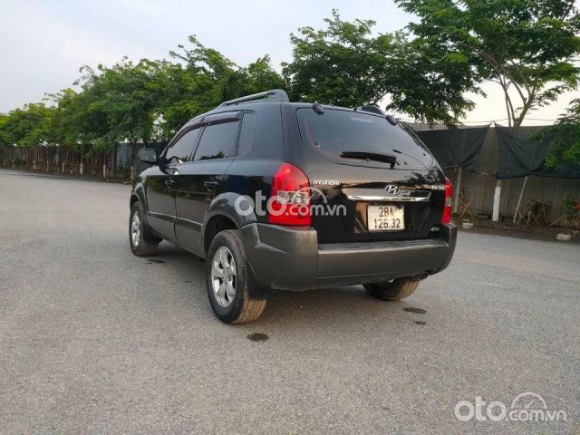 Cần bán xe Hyundai Tucson năm 2009, màu đen, nhập khẩu số tự động0