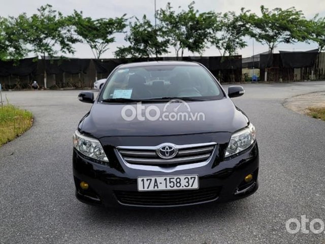 Cần bán xe Toyota Corolla Altis sản xuất năm 2008, màu đen0